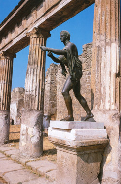 Statue of Apollo. Temple of Apollo at the ruins of Pompeii