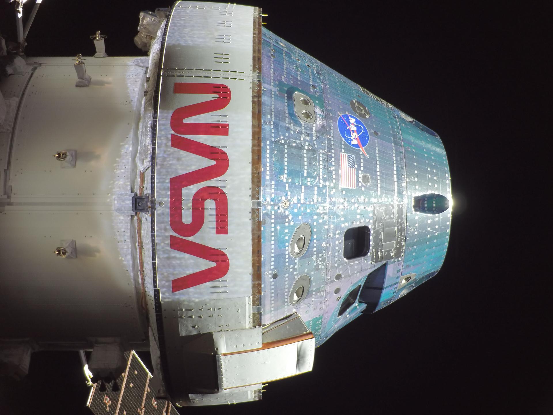 closeup of Orion capsule, Integrity, in flight