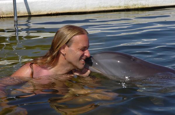 Dolphin kissing me